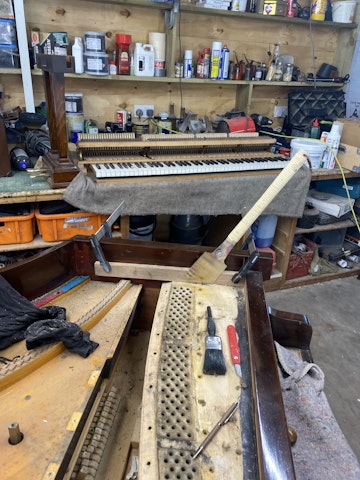 Sawing the grand piano wrest plank for replacement