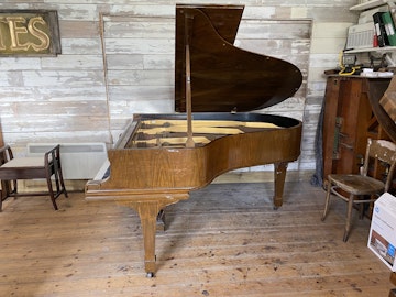 The old finish on this Steinway O grand piano was much in need of restoration